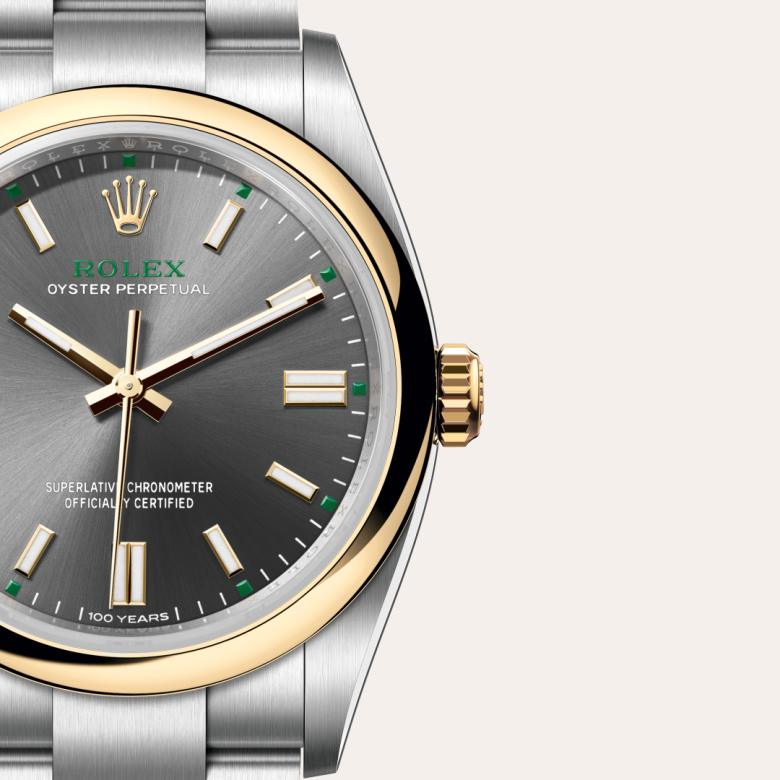 ด้านหน้า Rolex Oyster Perpetual ในวัสดุ Yellow Rolesor, m126003-0001 กับเหรียญรับประกันสีเขียว - นำสว่าง
