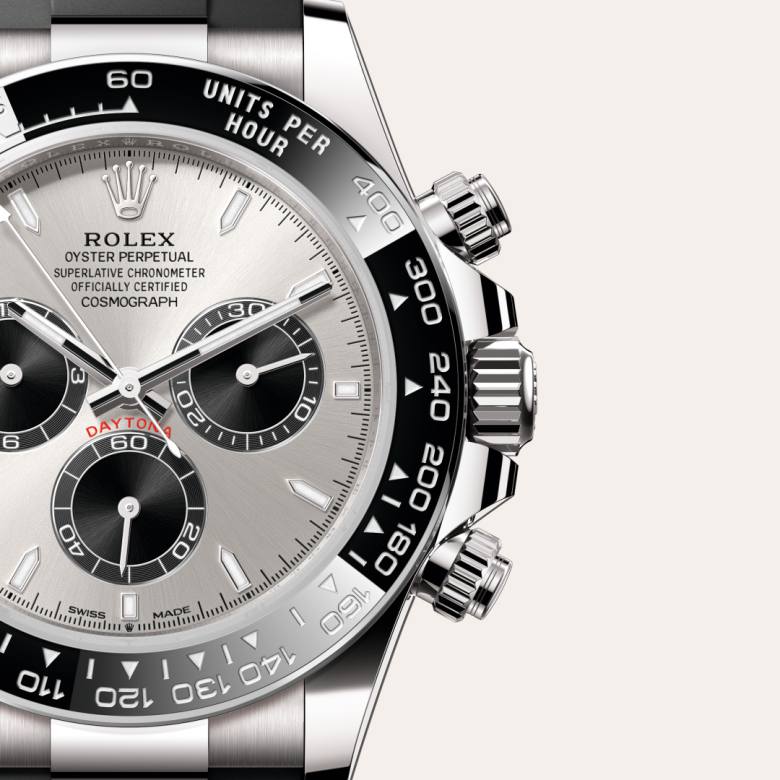 ด้านหน้า Rolex Cosmograph Daytona ในวัสดุ ทองคำขาว 18 กะรัต, m126519ln-0006 กับเหรียญรับประกันสีเขียว - นำสว่าง