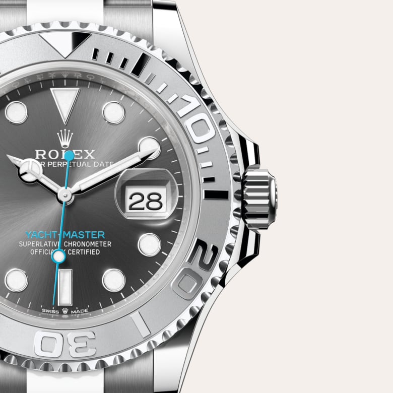ด้านหน้า Rolex Yacht-Master ในวัสดุ Rolesium, m126622-0001 กับเหรียญรับประกันสีเขียว - นำสว่าง