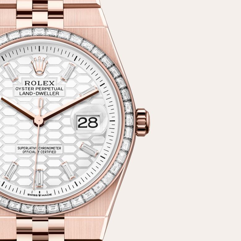 ด้านหน้า Rolex Land-Dweller ในวัสดุ เอเวอร์โรสโกลด์, m127285tbr-0002 กับเหรียญรับประกันสีเขียว - นำสว่าง