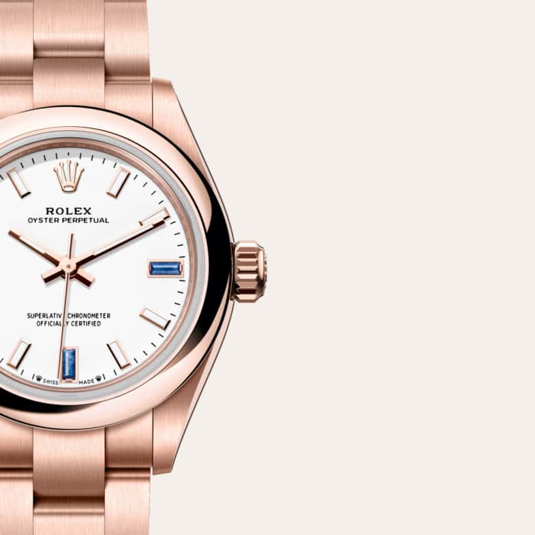 ด้านหน้า Rolex Oyster Perpetual ในวัสดุ เอเวอร์โรสโกลด์, m276205-0002 กับเหรียญรับประกันสีเขียว - นำสว่าง