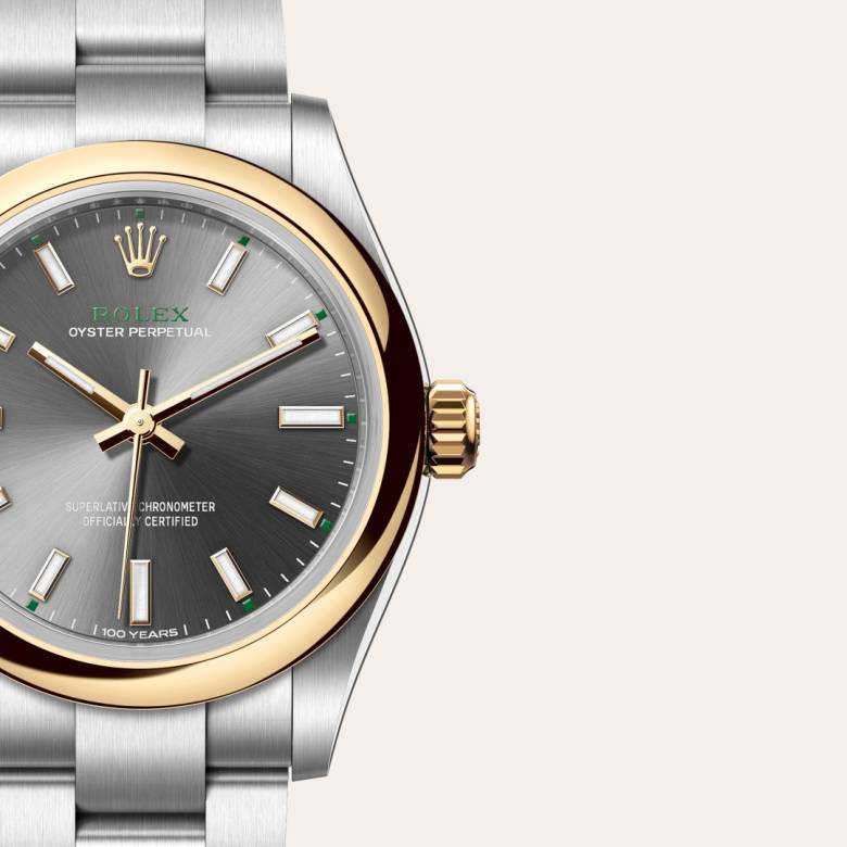 ด้านหน้า Rolex Oyster Perpetual ในวัสดุ Yellow Rolesor, m277203-0001 กับเหรียญรับประกันสีเขียว - นำสว่าง