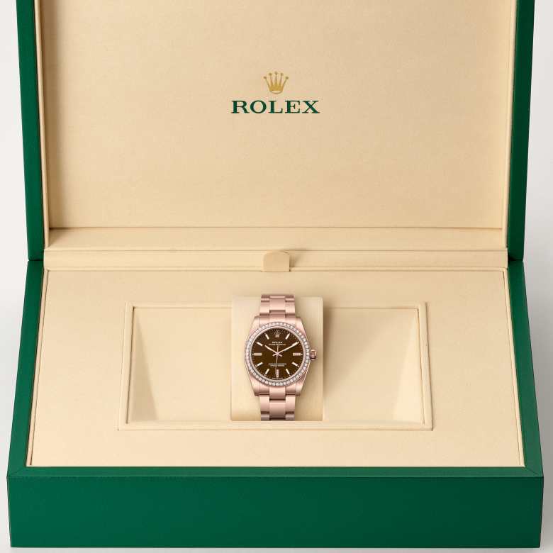 Front view of Rolex Oyster Perpetual in 18 ct Everose gold, m124245rbr-0001 in the box - Nam Sawang