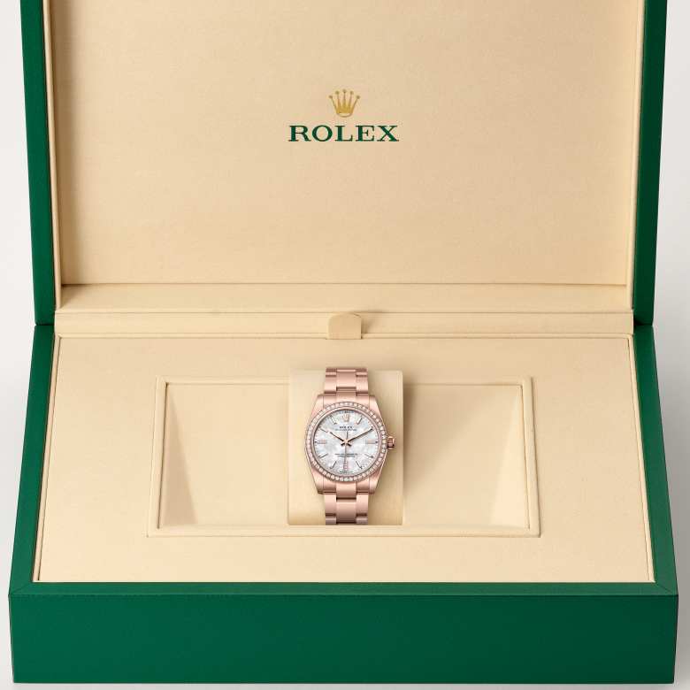 Front view of Rolex Oyster Perpetual in 18 ct Everose gold, m124245rbr-0002 in the box - Nam Sawang