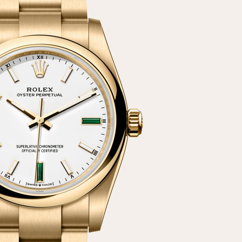 Front view of Rolex Oyster Perpetual in 18 ct yellow gold, m124208-0002 with green seal - Nam Sawang