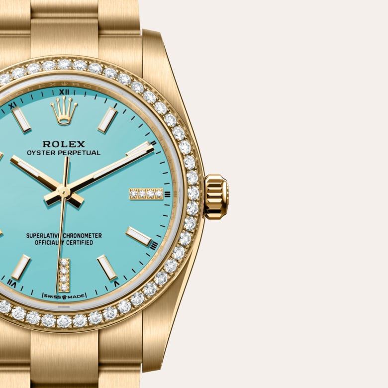 Front view of Rolex Oyster Perpetual in 18 ct yellow gold, m124248rbr-0002 with green seal - Nam Sawang