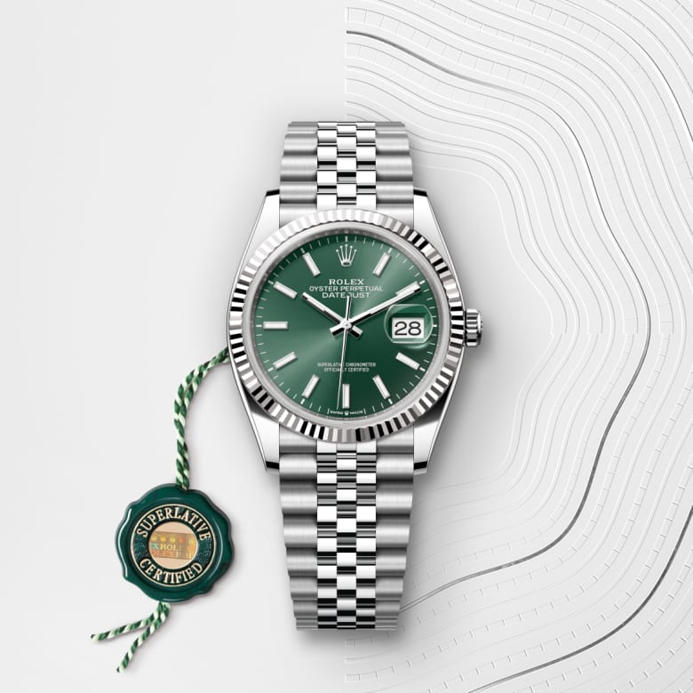 ด้านหน้า Rolex Datejust ในวัสดุ White Rolesor, m126234-0051 กับเหรียญรับประกันสีเขียว - นำสว่าง
