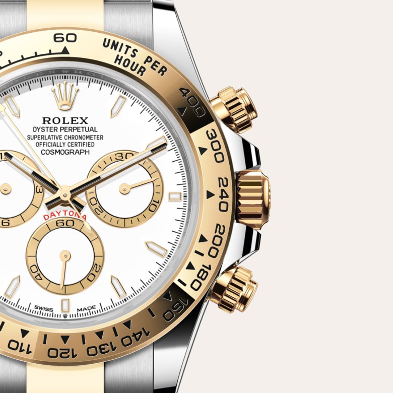 ด้านหน้า Rolex Cosmograph Daytona ในวัสดุ Yellow Rolesor, m126503-0001 กับเหรียญรับประกันสีเขียว - นำสว่าง