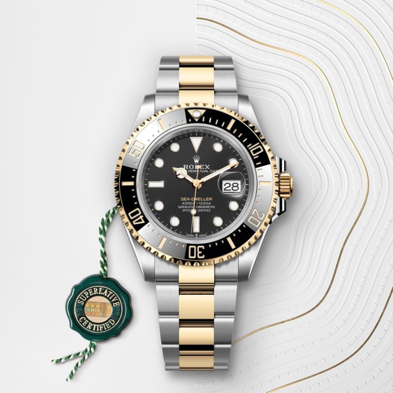 Front view of Rolex Sea-Dweller in Yellow Rolesor - combination of Oystersteel and yellow gold, m126603-0001 with green seal - Nam Sawang
