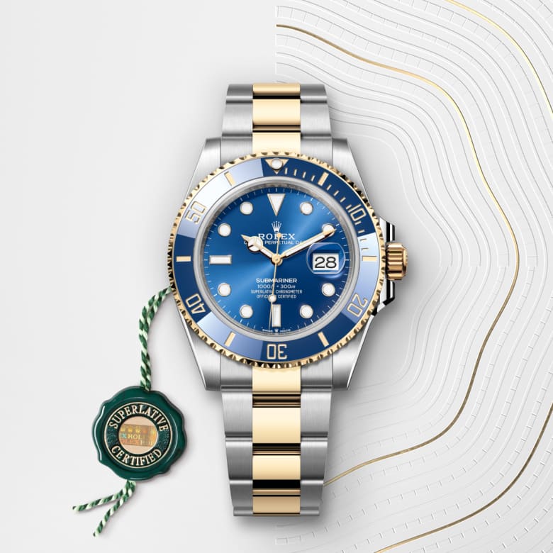 ด้านหน้า Rolex Submariner ในวัสดุ Yellow Rolesor, m126613lb-0002 กับเหรียญรับประกันสีเขียว - นำสว่าง