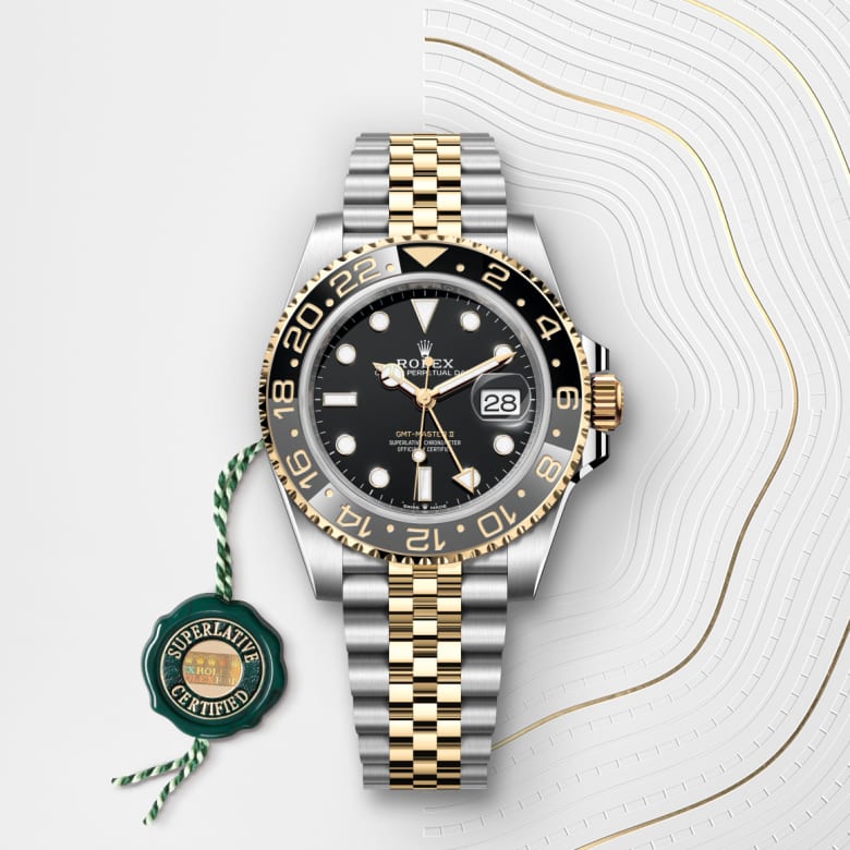Front view of Rolex GMT-Master II in Yellow Rolesor - combination of Oystersteel and yellow gold, m126713grnr-0001 with green seal - Nam Sawang