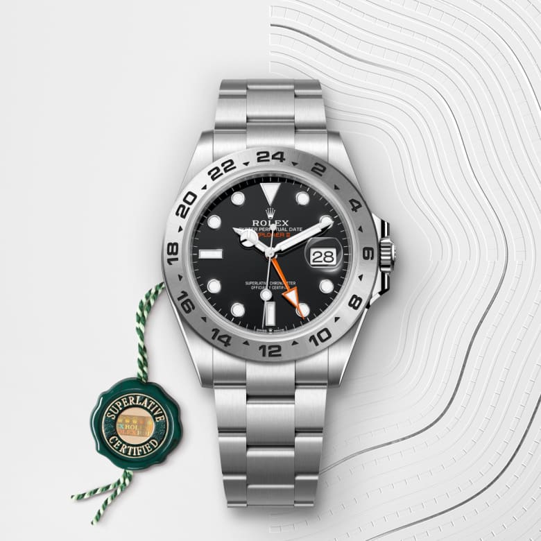 ด้านหน้า Rolex Explorer ในวัสดุ Oystersteel, m226570-0002 กับเหรียญรับประกันสีเขียว - นำสว่าง